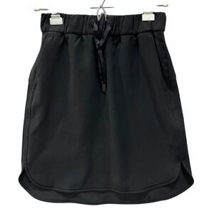 Lululemon On the Fly Skirt Size 4 Black Woven Drawstring Athletic Mini